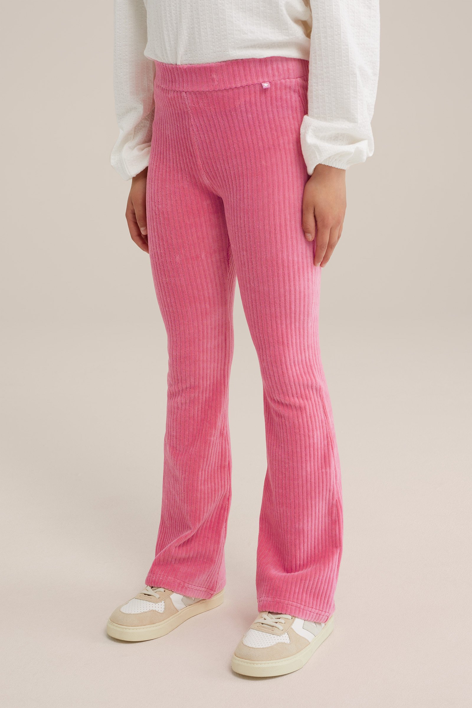 Meisjes velvet flared legging van ribstof WE Fashion Felroze