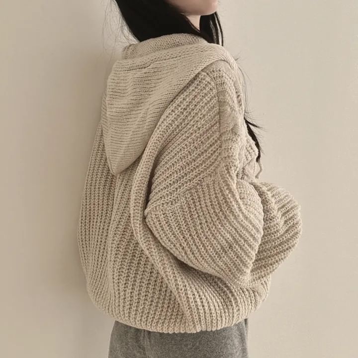 MIKIGA - Oversized kabelgebreide hoodie met rits