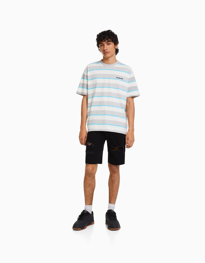 Bermuda jeans rasgada de corte justo