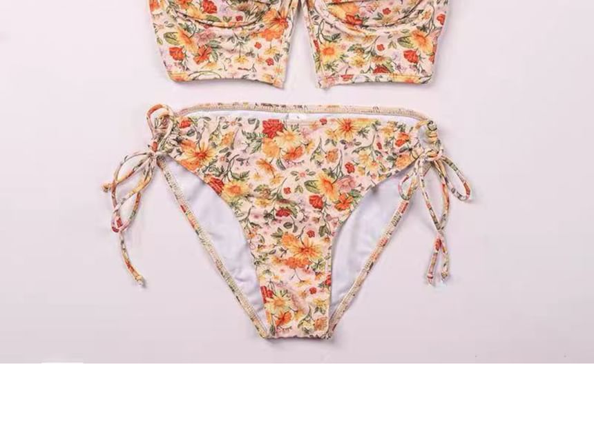 Sancus - Set: Bikini met trekkoord en bloemenprint + omslagrok