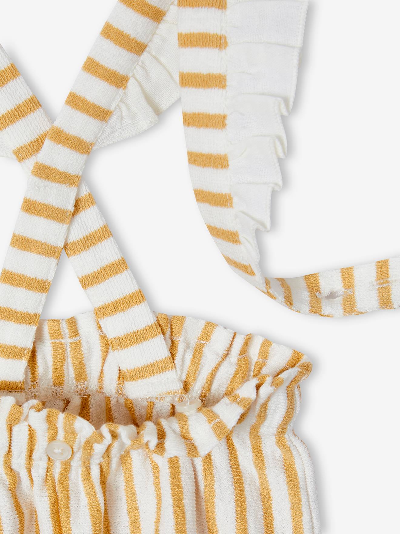 Calças de bebê listradas em coral com suspensórios