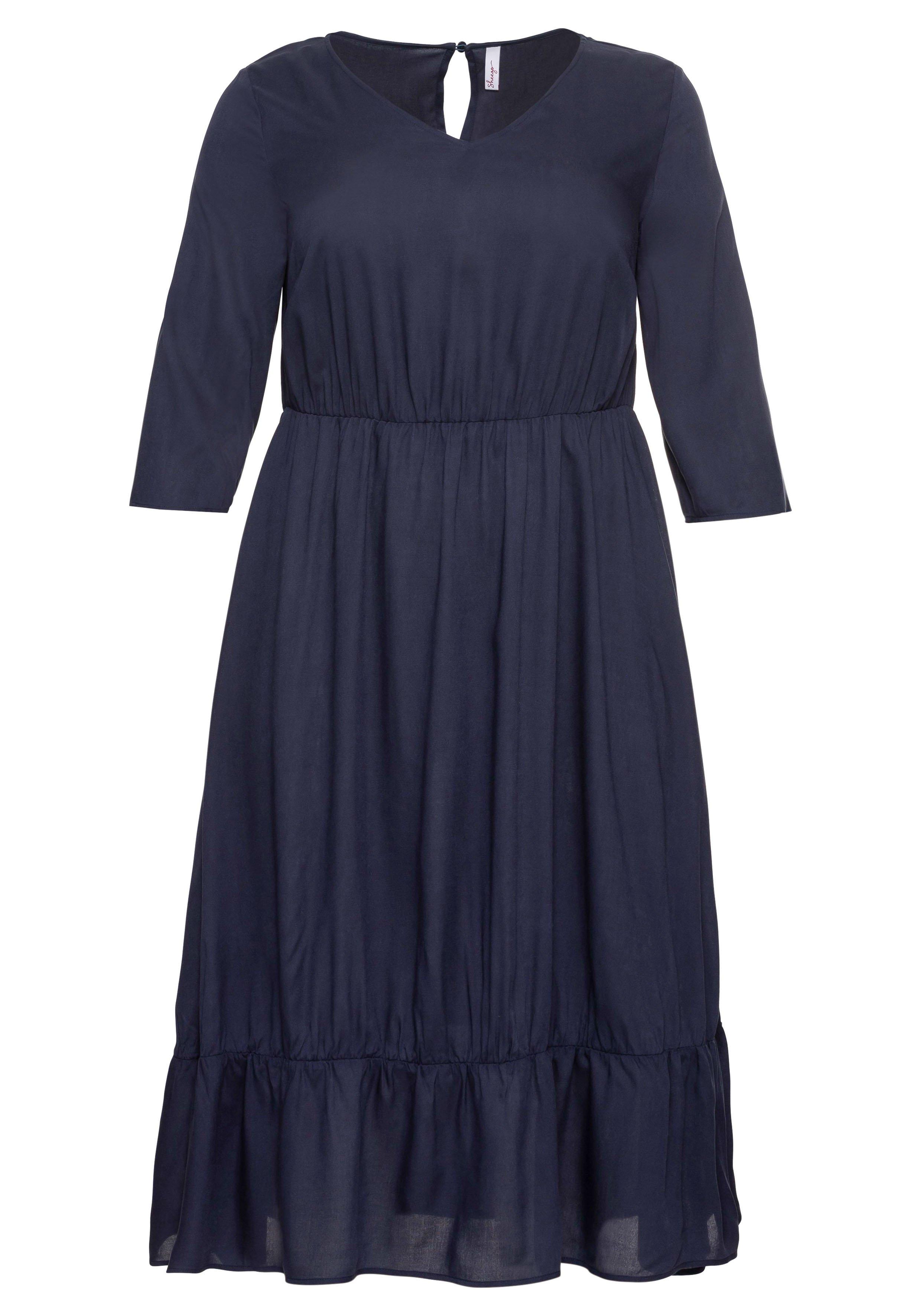 Kleid mit 3/4-Ärmel und Volant am Saum