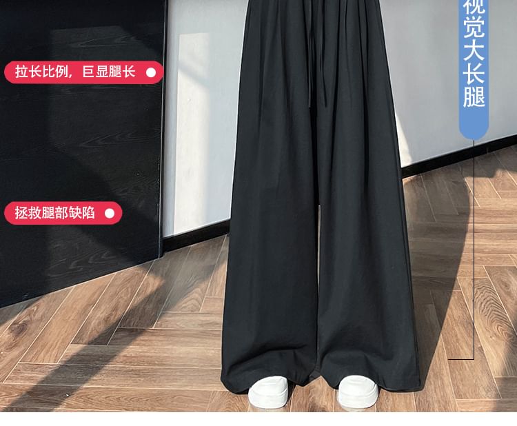 Tel tot 10 - Effen broek met wijde pijpen en trekkoord in de taille (verschillende ontwerpen)