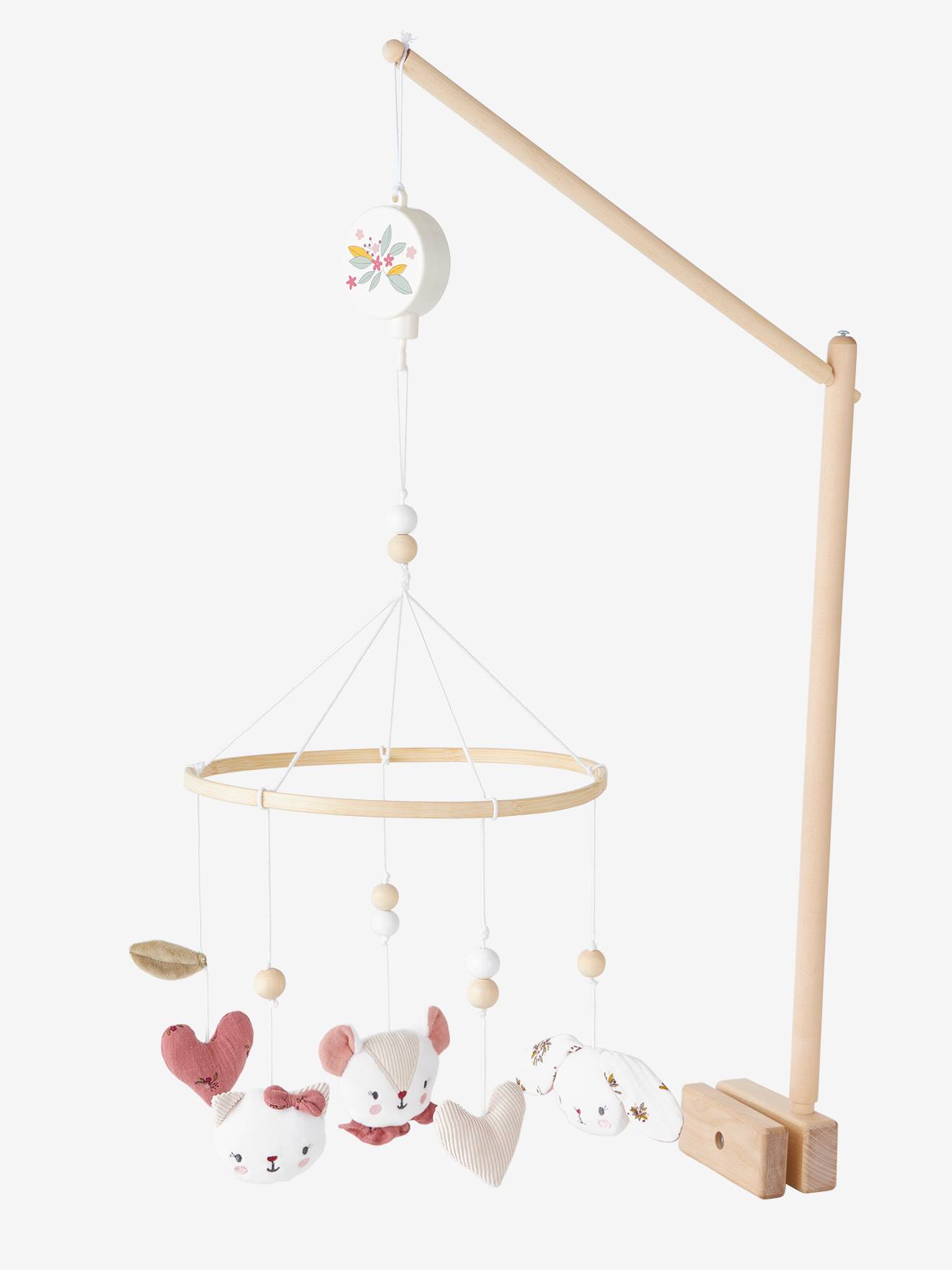 Móvel musical Loft em rosa claro liso com motivos.
