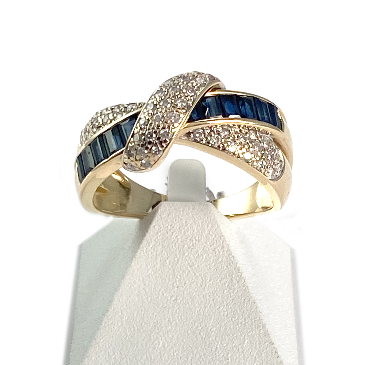 Bague d'occasion entrelacée or 750 jaune saphirs et diamants