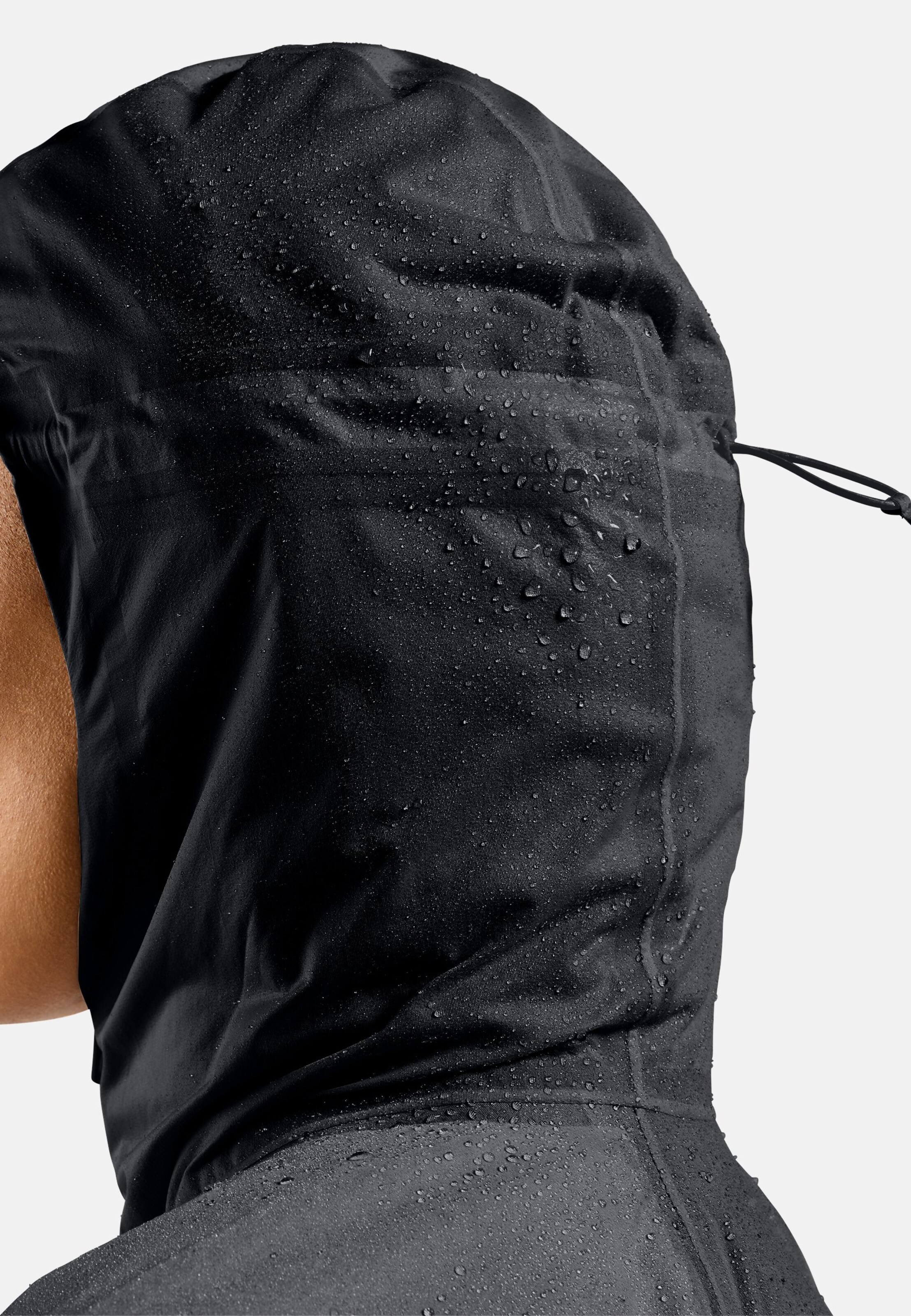 Isolierte und wasserdichte Dual Dry Performance Knit Laufjacke in black
