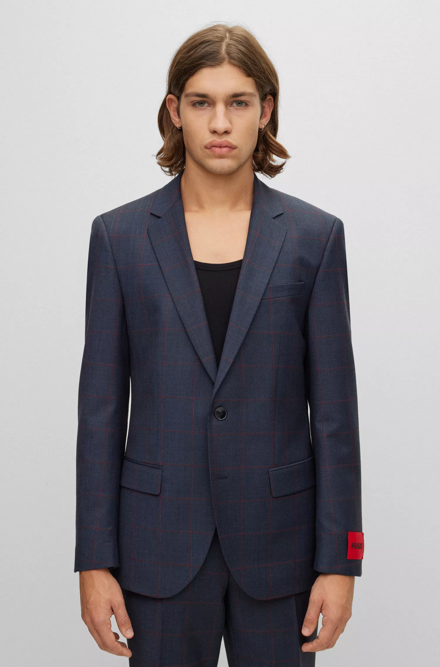 Terno slim fit xadrez vermelho HUGO em mistura de lã elástica.