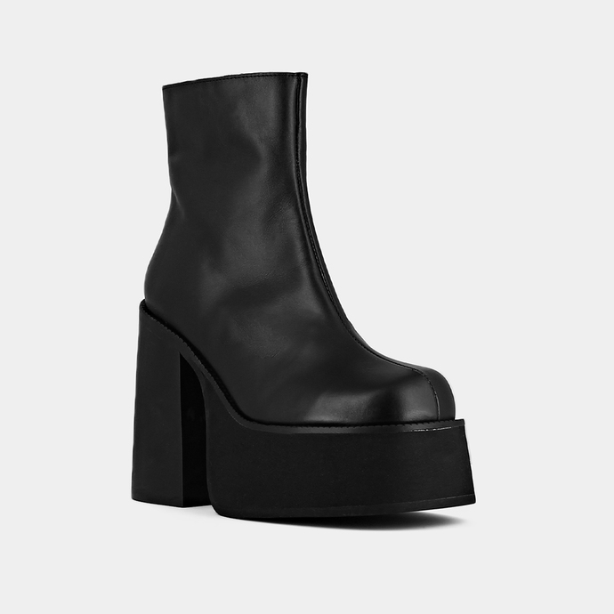 Boots à plateformes et bouts carrés  en cuir noir