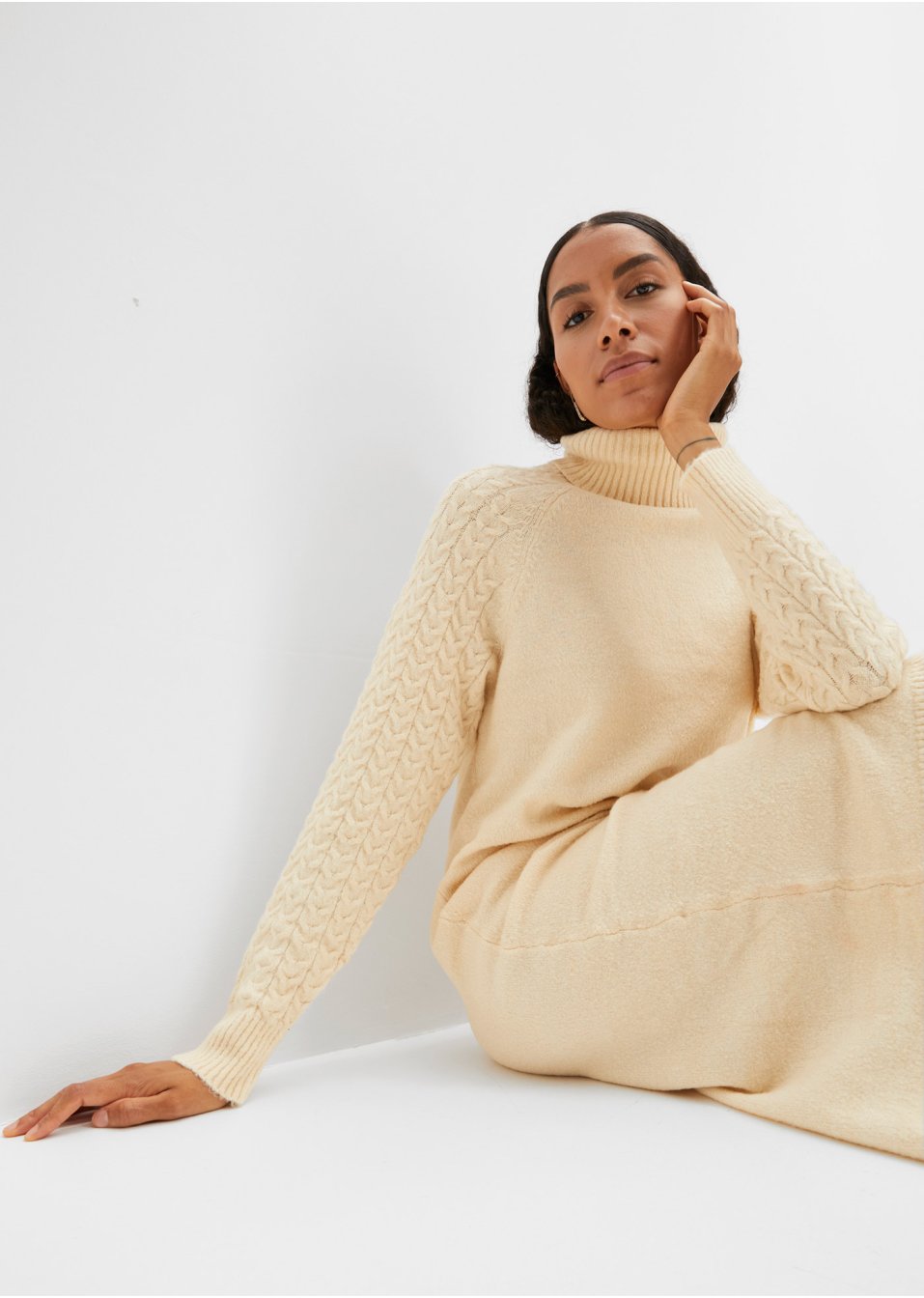 Robe en maille avec torsades sur les manches