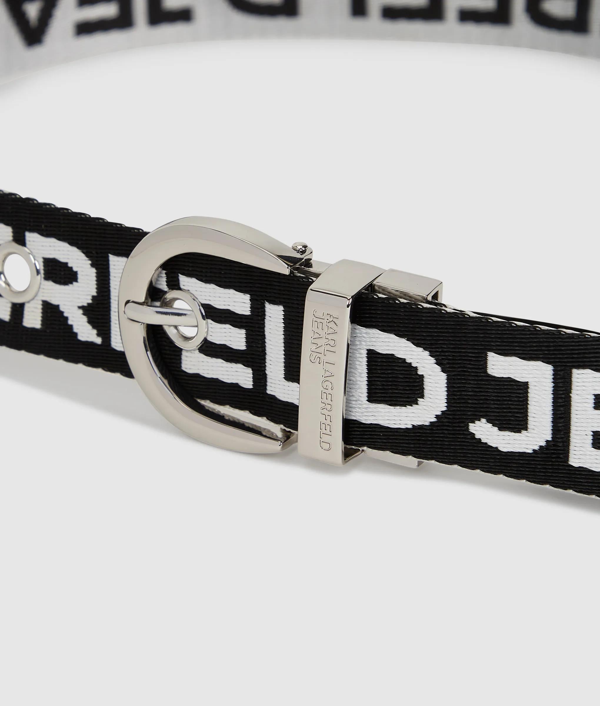 Omkeerbare webbing riem