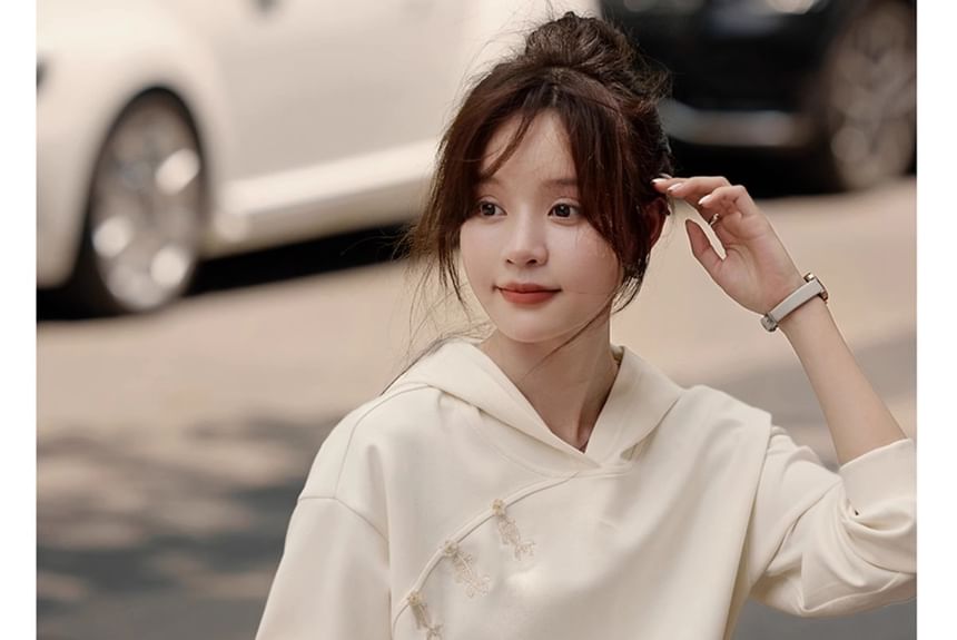 Jeonseon - V-hals hoodie met effen borduursel en verlaagde schouders