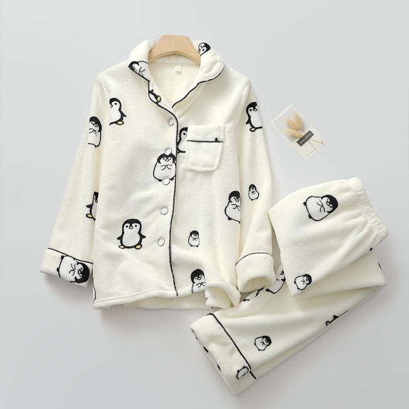 Finlies - Koppel bijpassende pyjamaset: top met lange mouwen en pinguïnprint + broek (verschillende ontwerpen)
