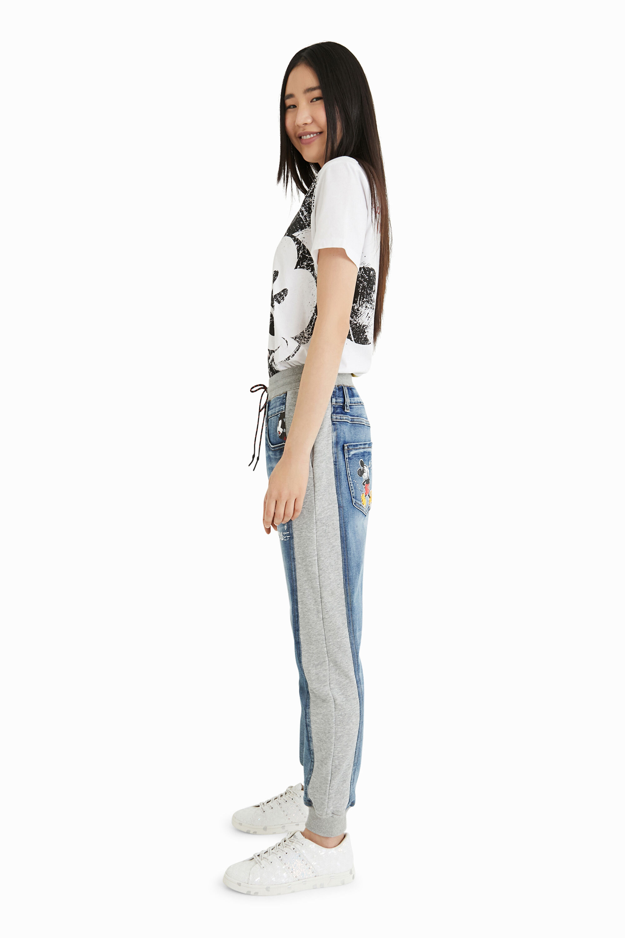 Jean jogging Mickey Mouse