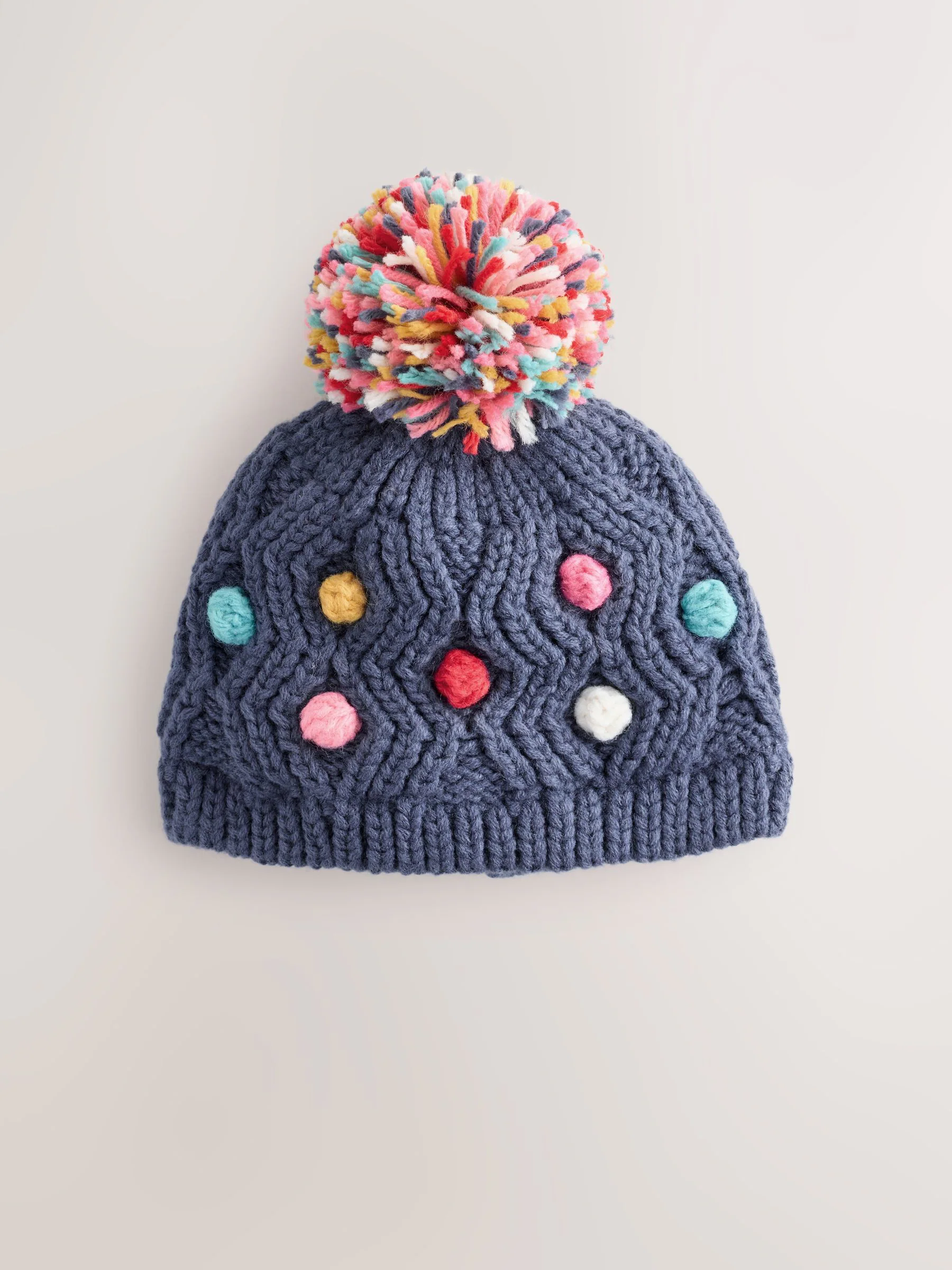 Marineblauw - Gebreide babymuts met vrolijke pompon (0mnd-2jr)