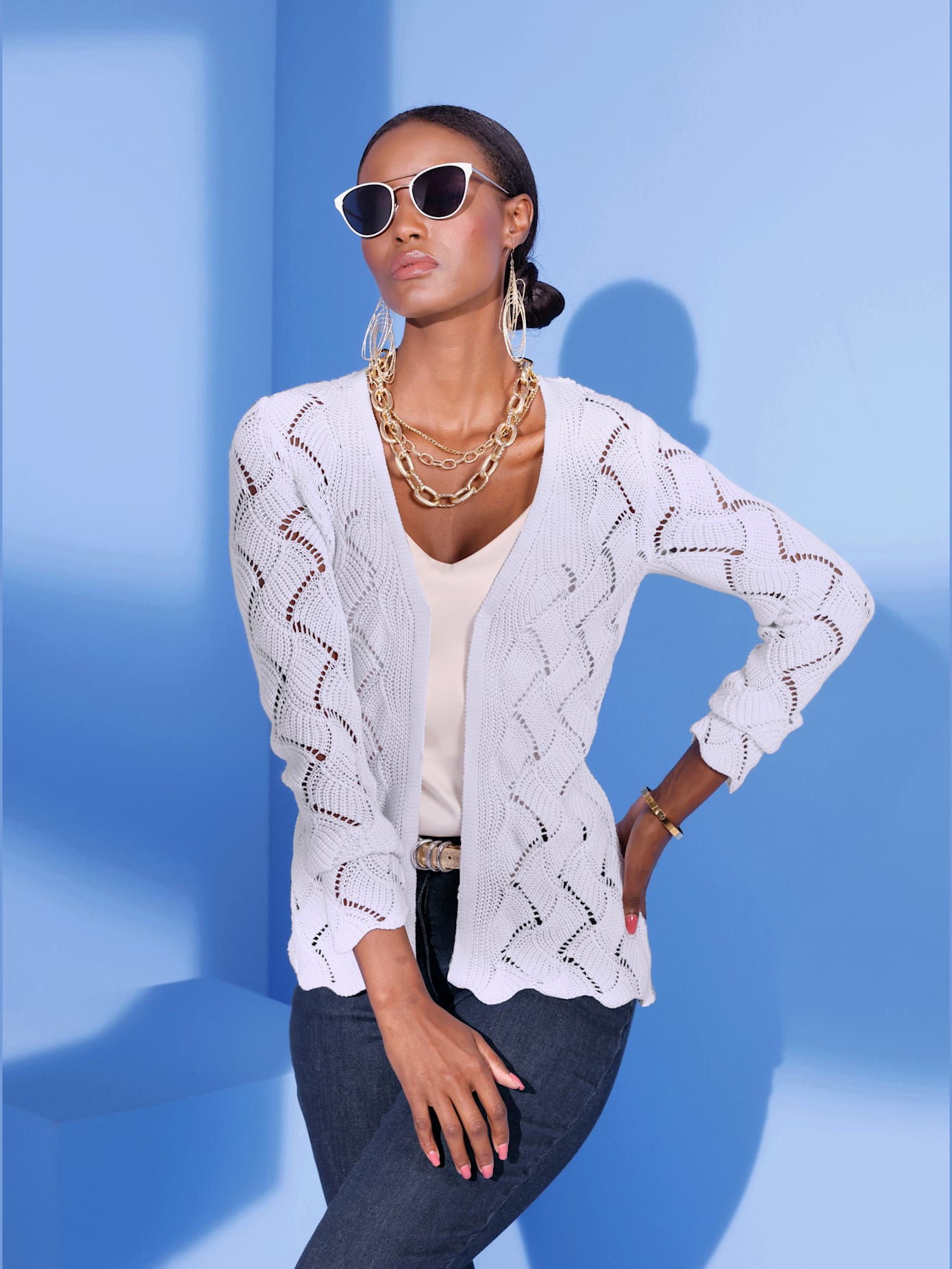 Veste en tricot motif ajouré élégant
