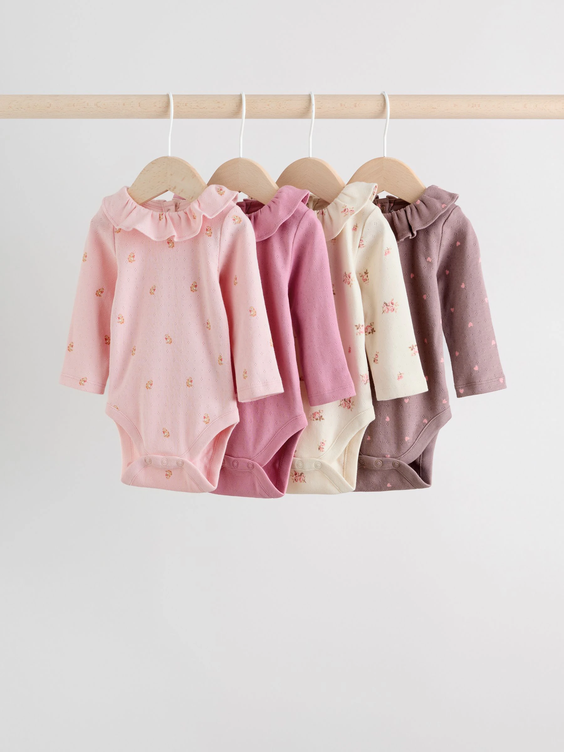 Roze/crème/bruin met fijne bloemetjesprint - Verpakking van 4 babyrompers met lange mouwen en ruches (0mnd-2jr)