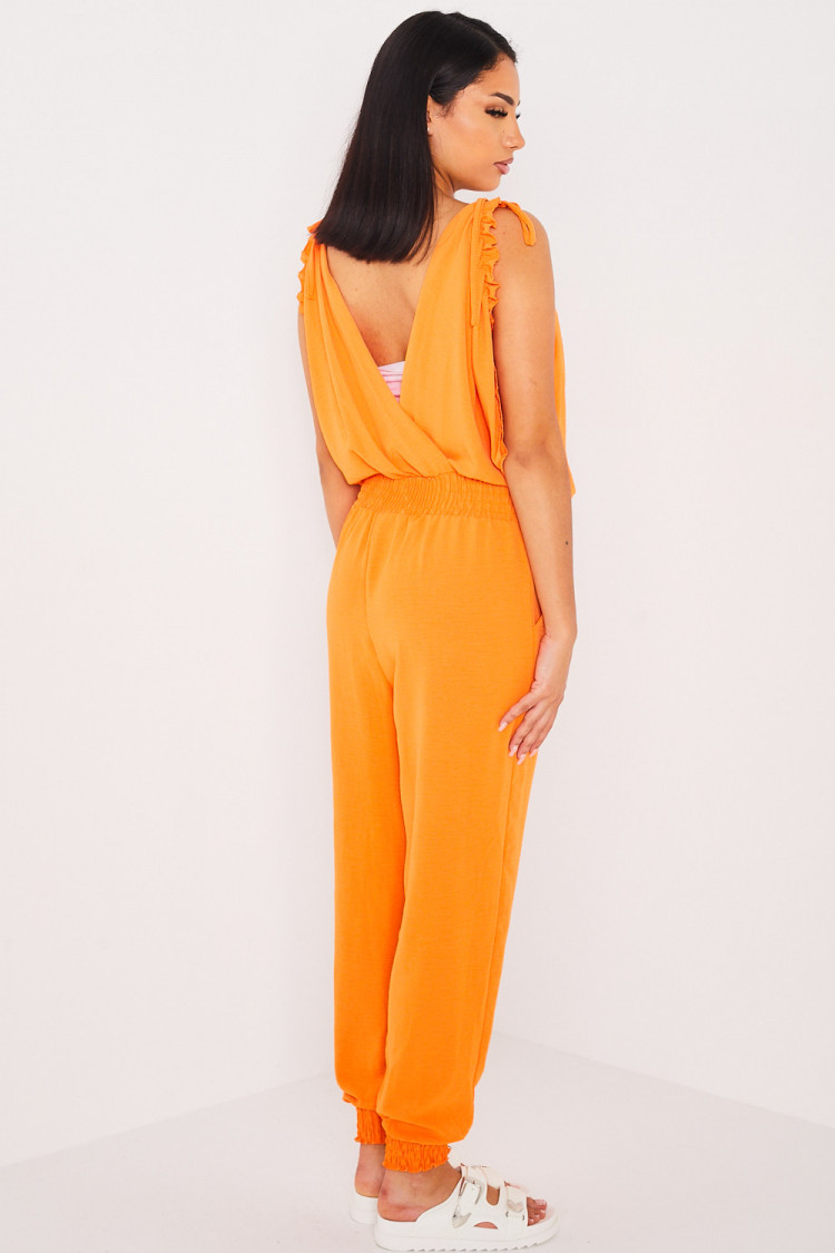 Combinaison pantalon orange fluide à manches noué