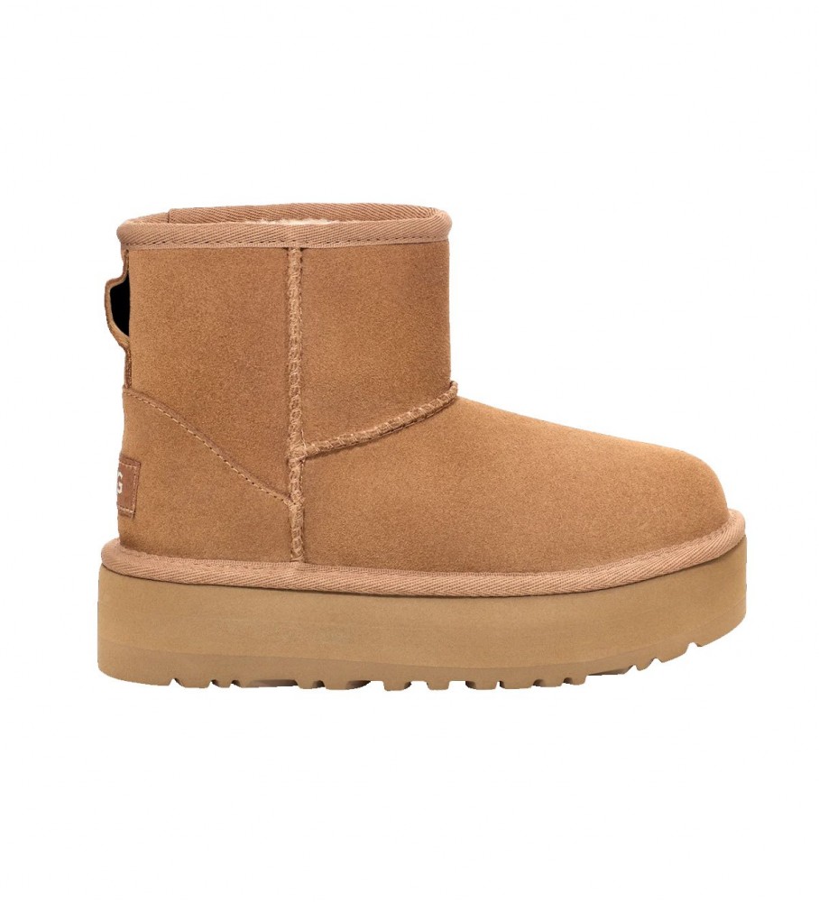 Botas de cano curto UGG K Classic Mini Platform em couro marrom