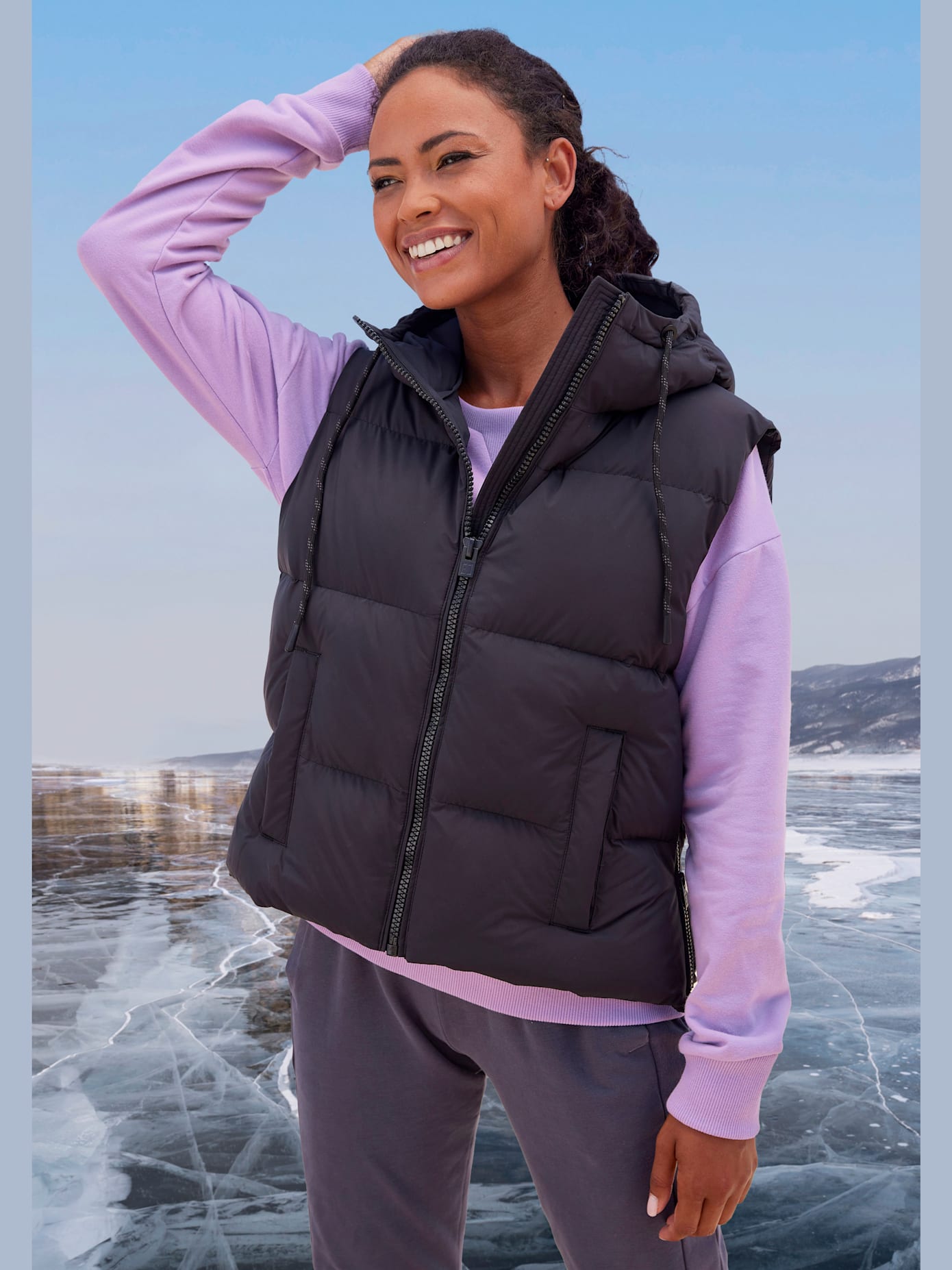 Gilet matelassé doublé avec capuche réglable