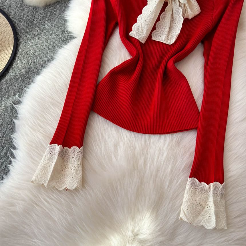 Yearnin - Set: lange mouwen, effen gebreide top met lintaccent + hoge taille mini-plooirok