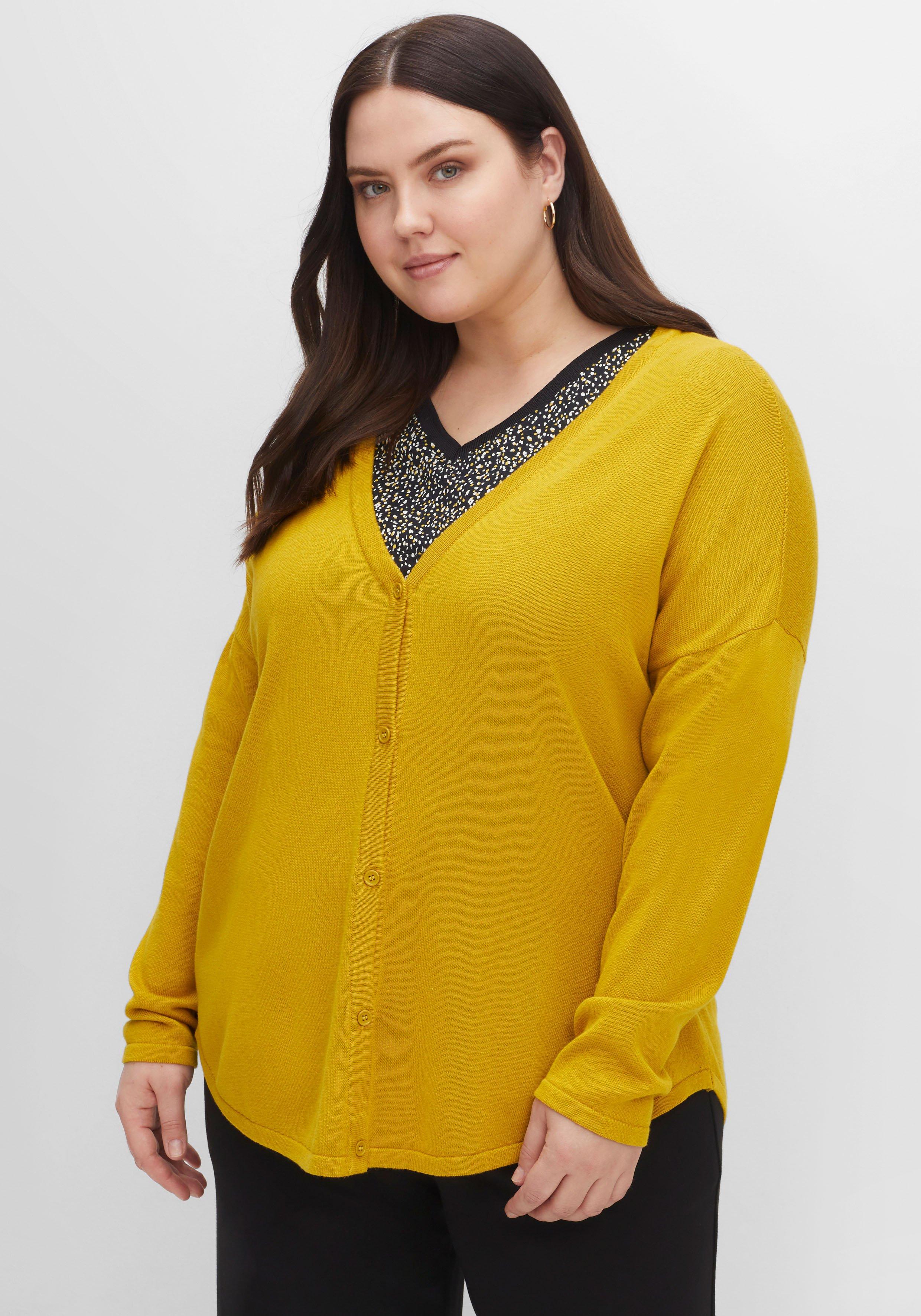 Strickjacke mit V-Ausschnitt und gerundetem Saum