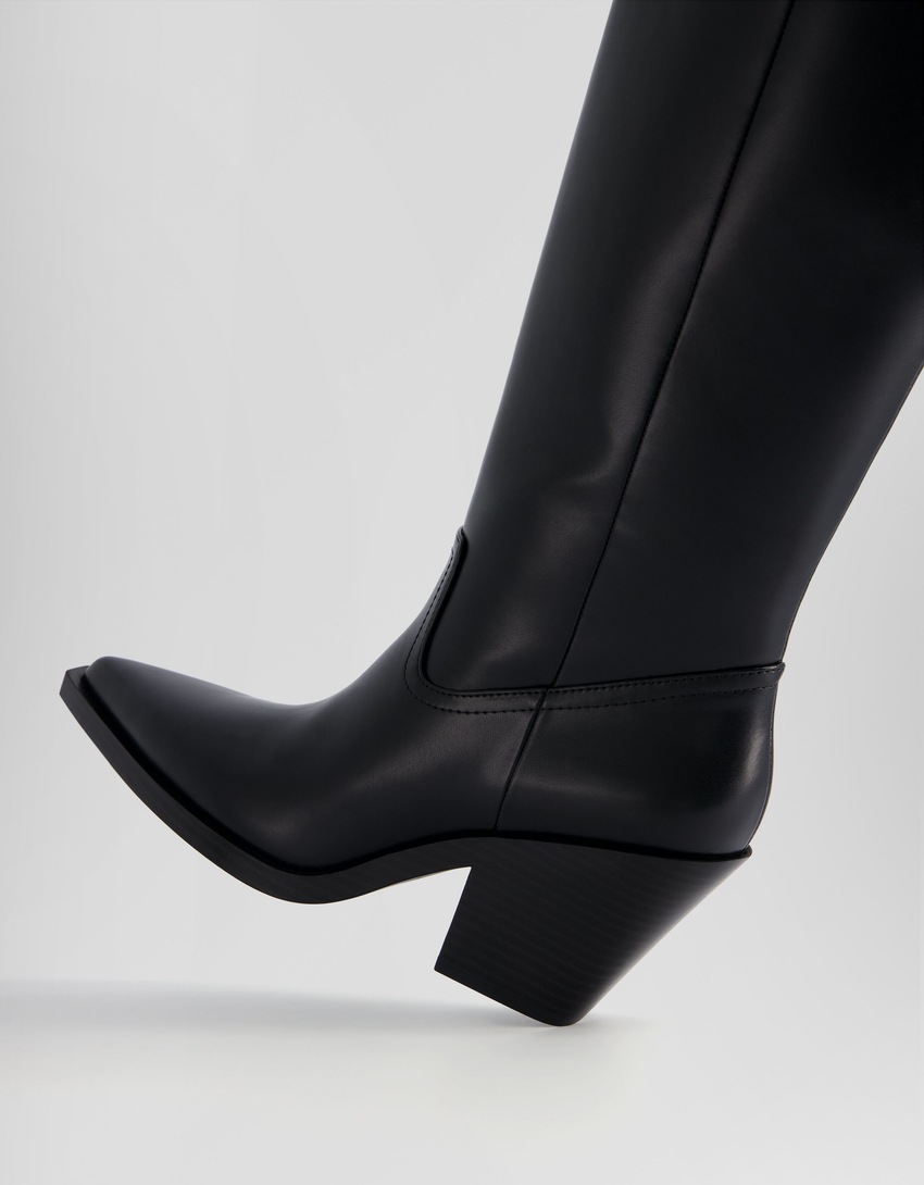Botas de cowboy com salto alto