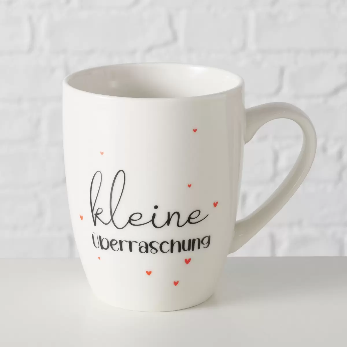 Becher Überraschung rot,schwarz,weiss