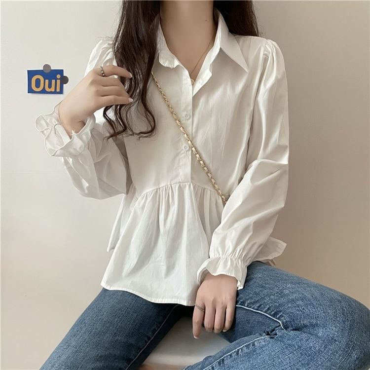 Sisyphi - Blouse met pofmouwen en knoopjes