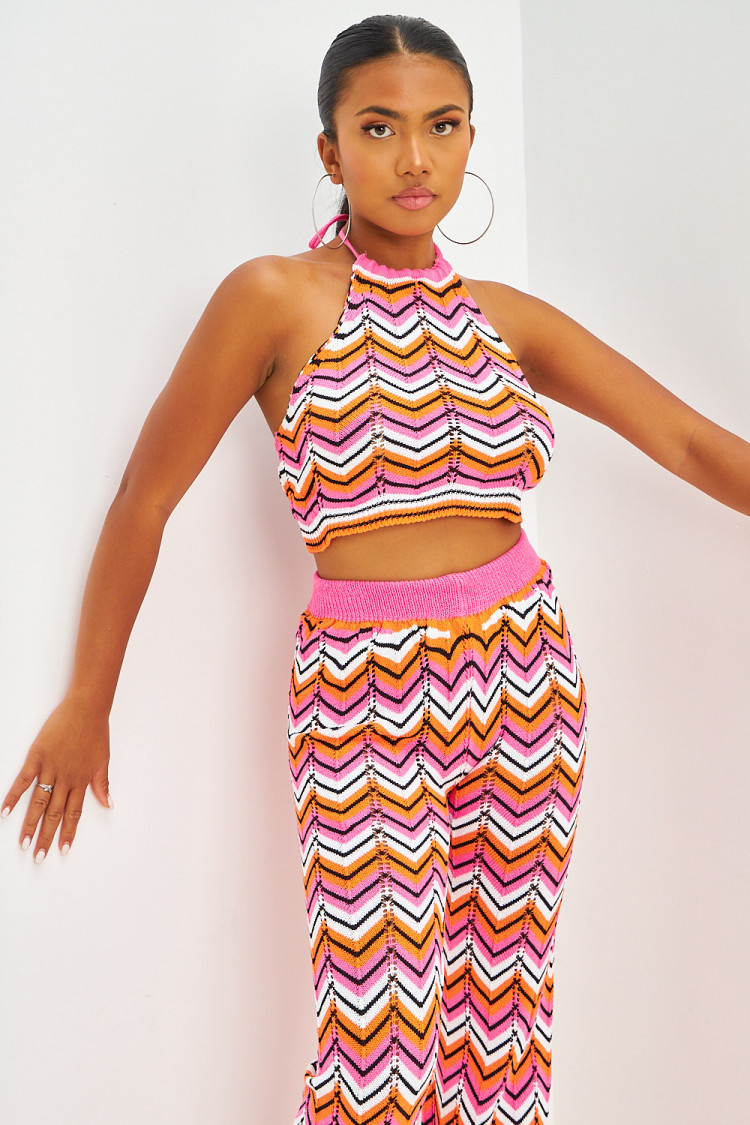 Ensemble top dos nu + pantalon en maille crochet à motifs chevrons orange et rose