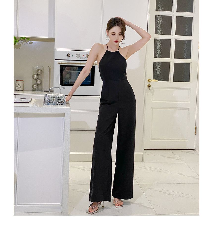 Juanita - Halter-hals jumpsuit met open rug en wijde pijpen