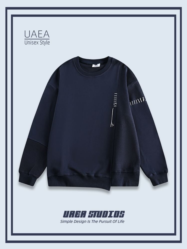 Chuoku - Asymmetrische sweatshirt met ronde hals en patchwork