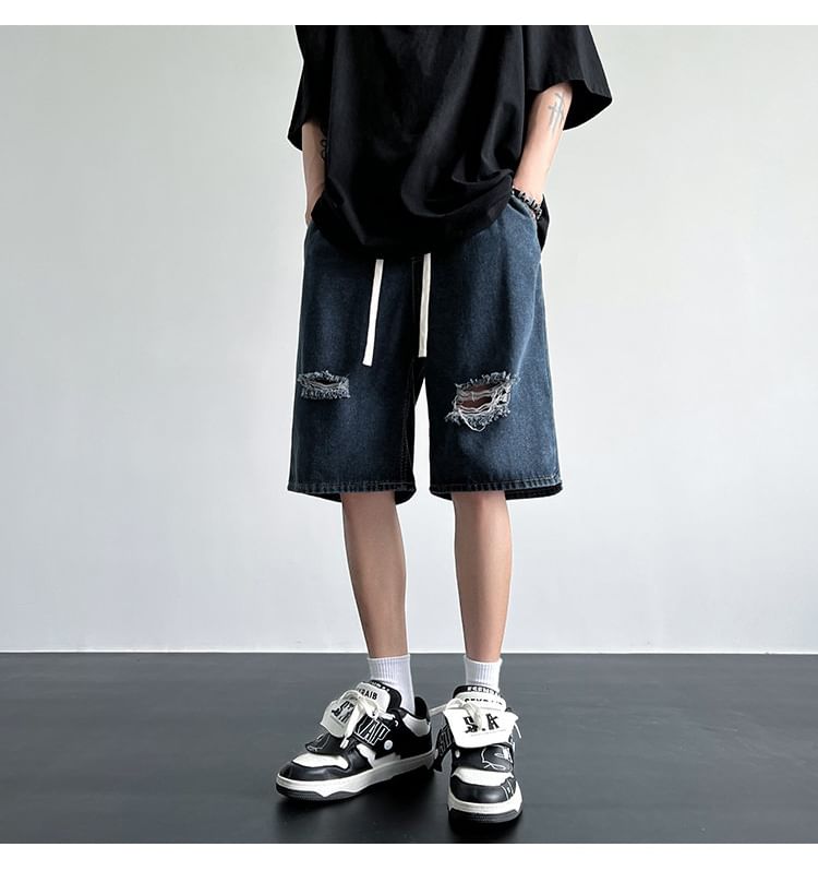 Femilina - Hoge taille denim shorts met distressed effect
