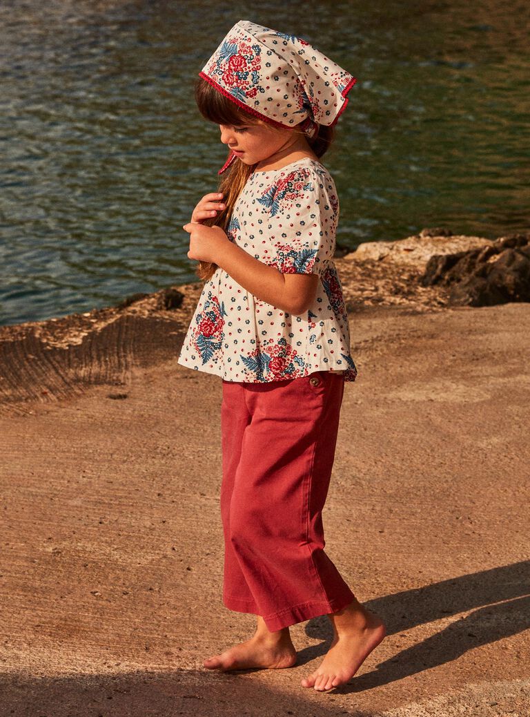 Blouse écrue à lanières croisées au dos