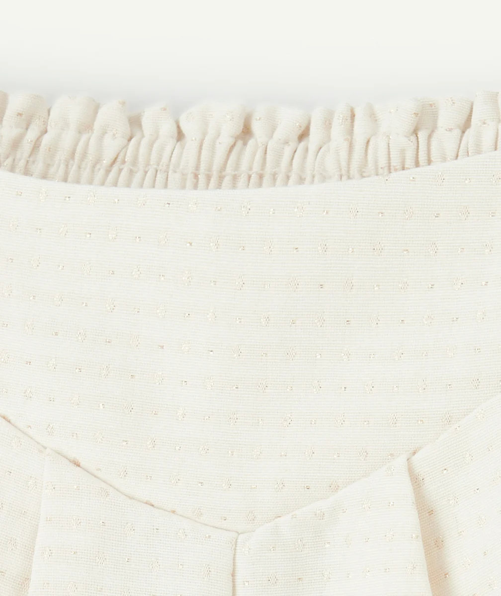SHORT FILLE TAILLE HAUT ÉCRU AVEC BRILLANCE COULEUR DORÉE PAILLETÉE