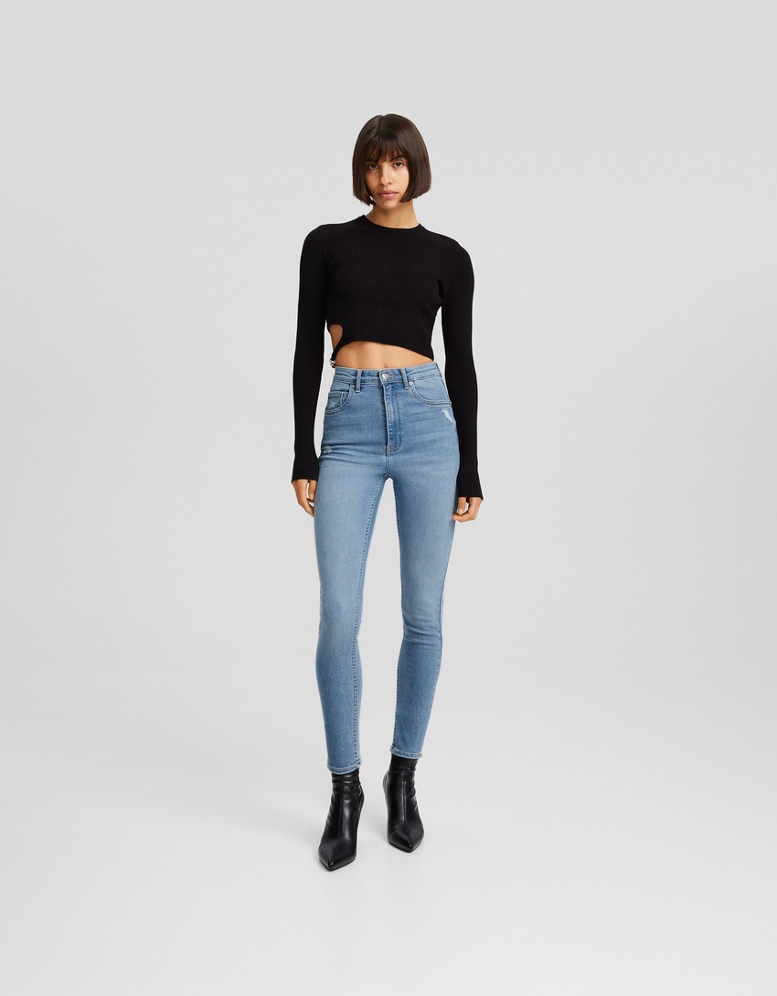 calça jeans skinny de cintura super alta