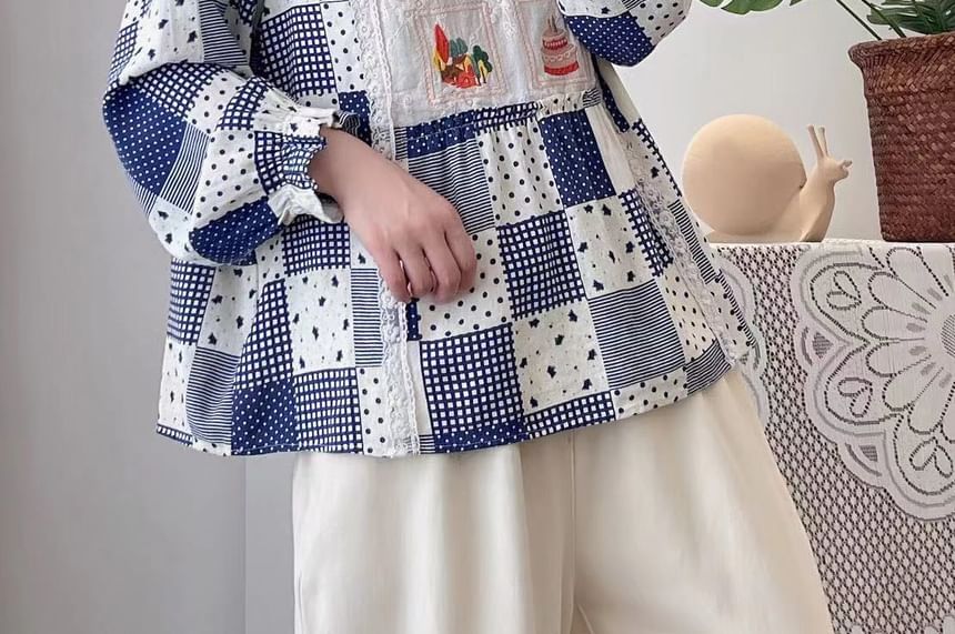 Aigan - Blouse met pofmouwen en kantversiering
