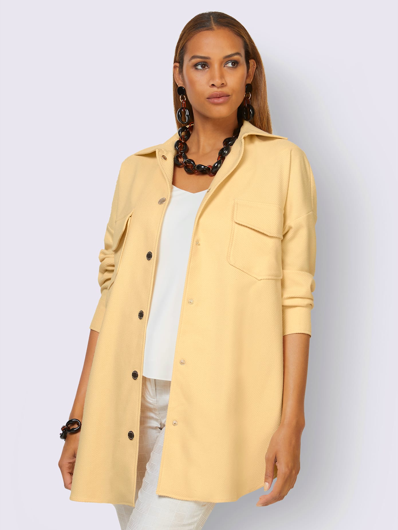 Veste patte de boutonnage pression sur toute la longueur devant