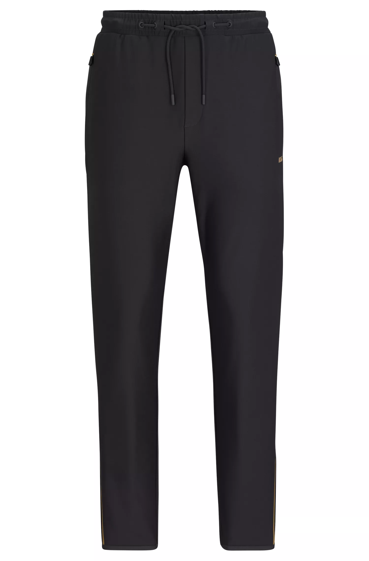 Calça de fato de treino BOSS verde, corte regular, com padrão refletor decorativo.