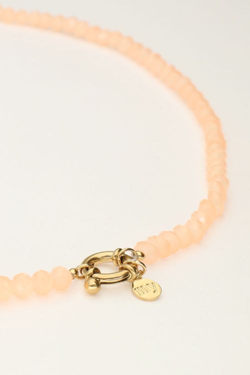 Oranje kralenketting met slotje