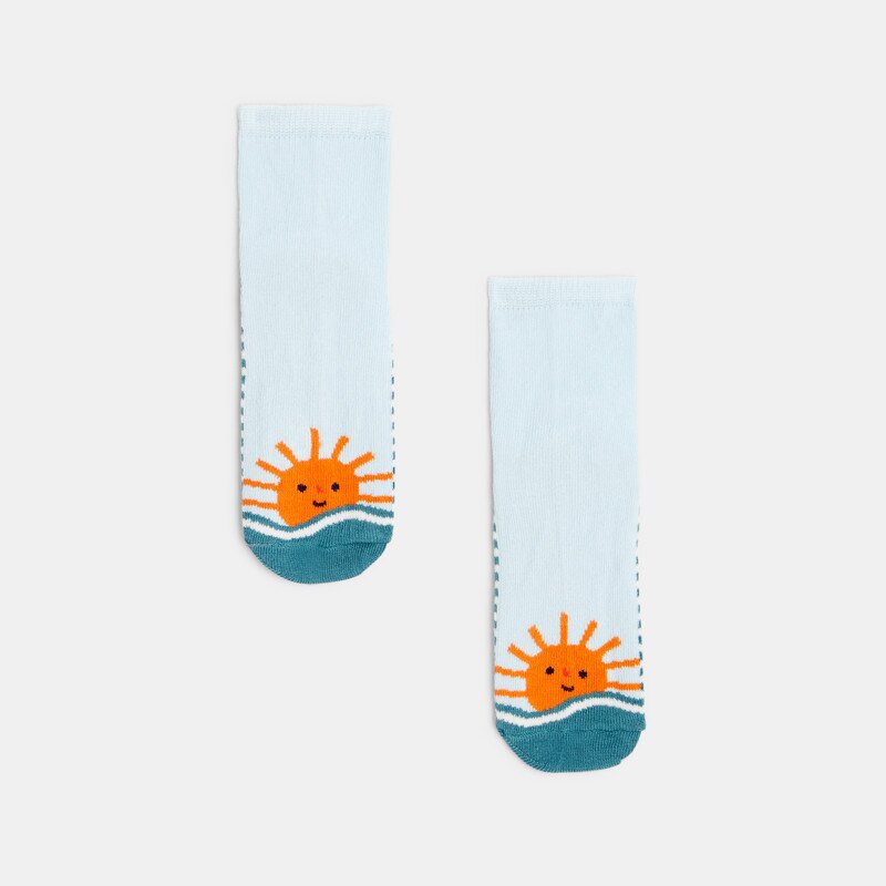 Chaussettes bébé garçon bleues à motifs soleil. Catimini Bleu