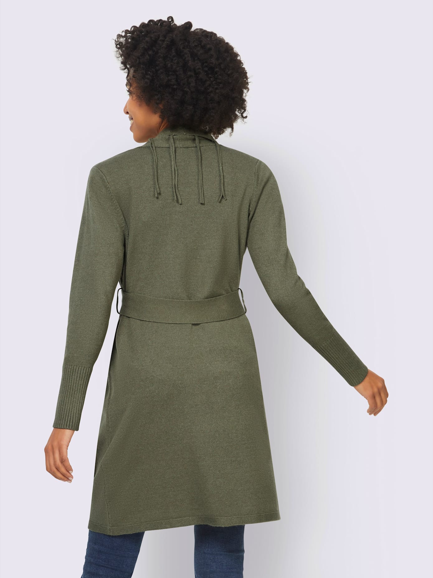 Veste en tricot bords à fines franges