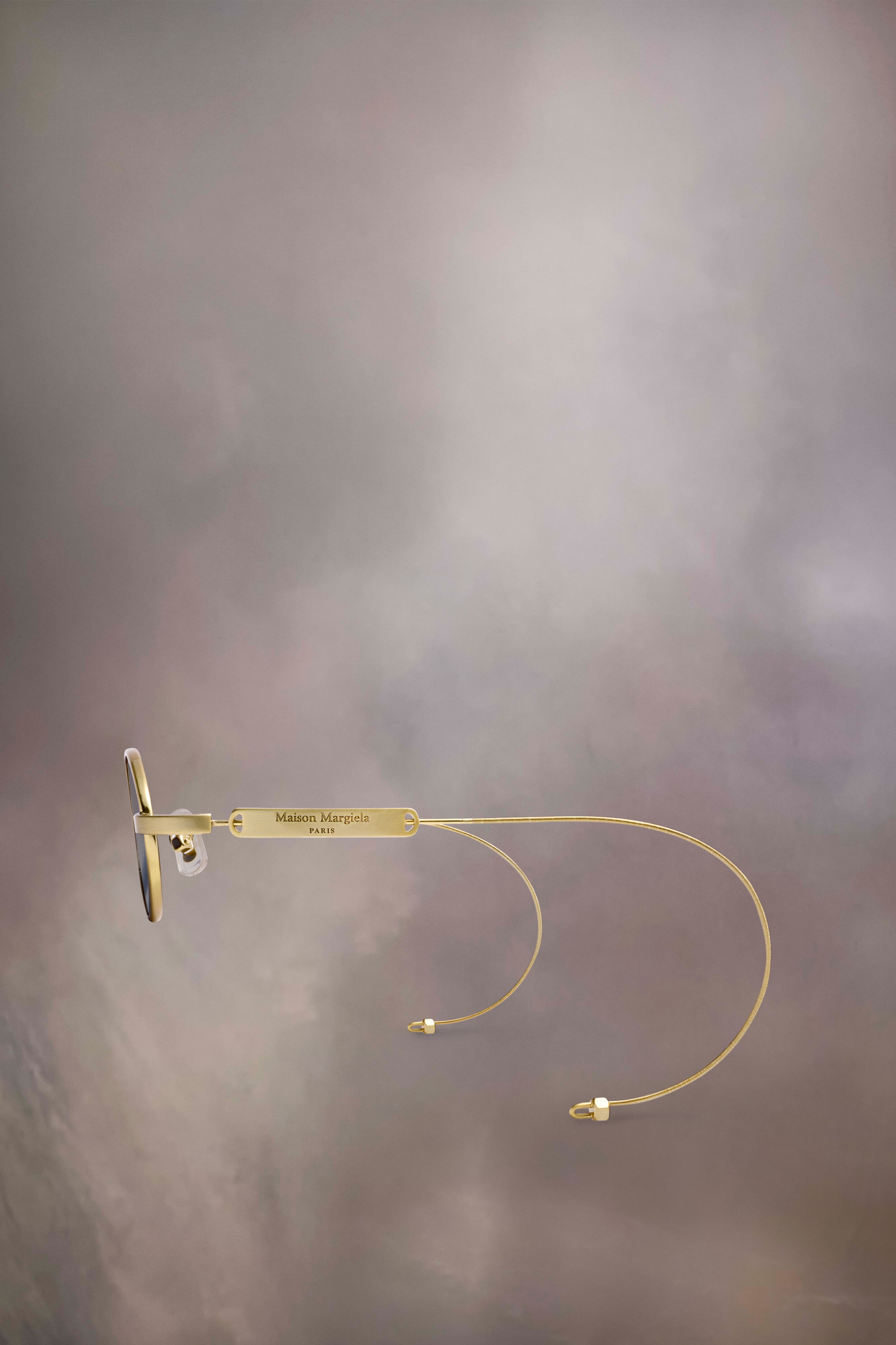 Lunettes de soleil ovales dorées x Gentle Monster​