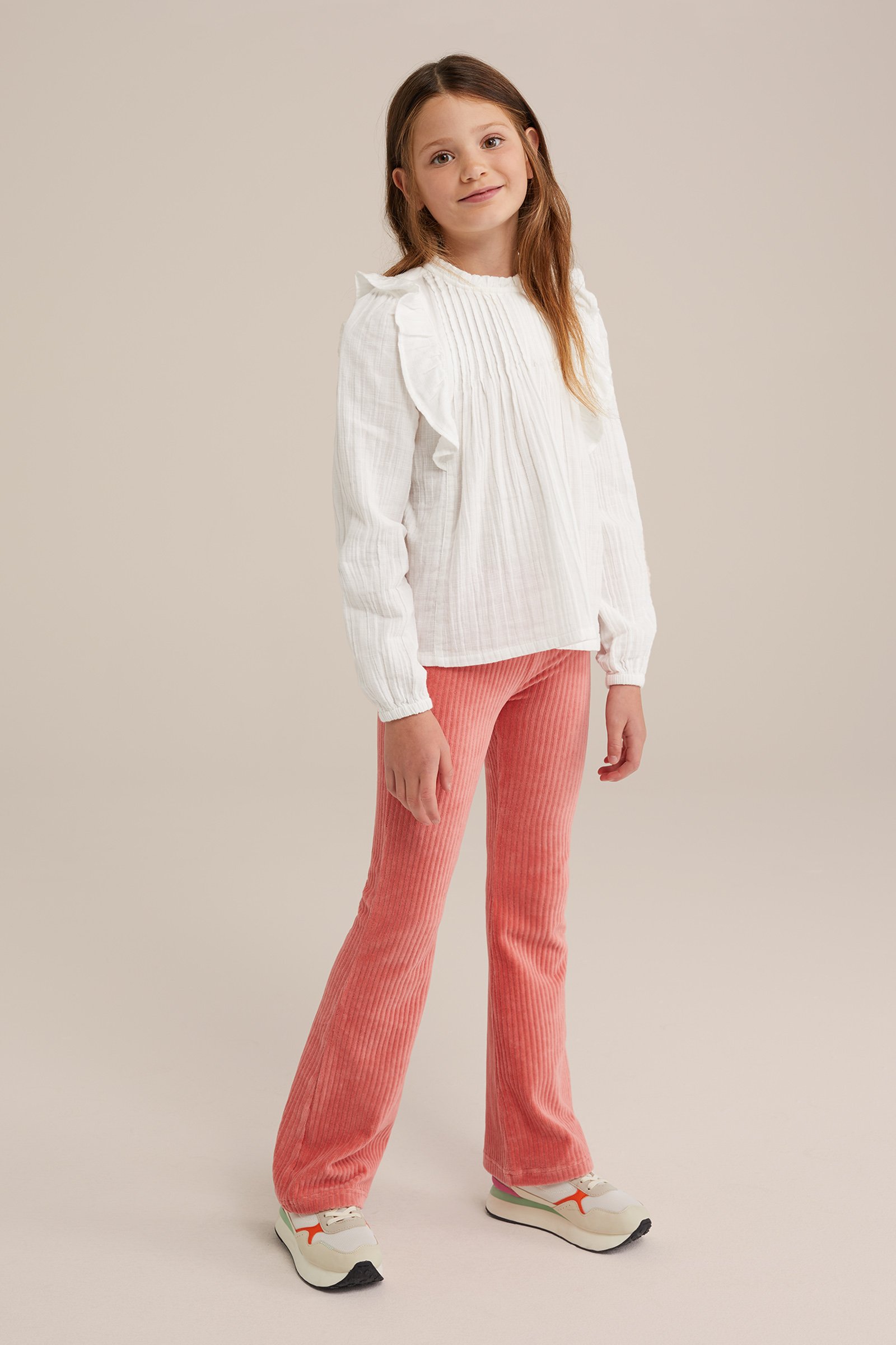 Meisjes velvet flared legging van ribstof WE Fashion Koraalroze