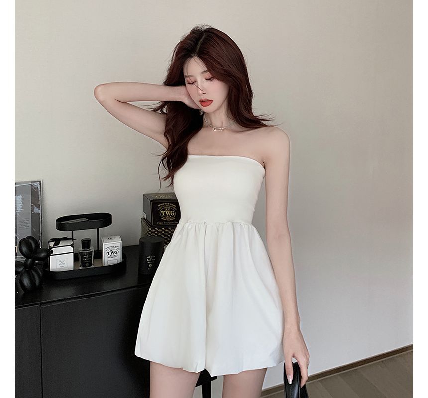Cerauno - Strapless romper met wijde pijpen