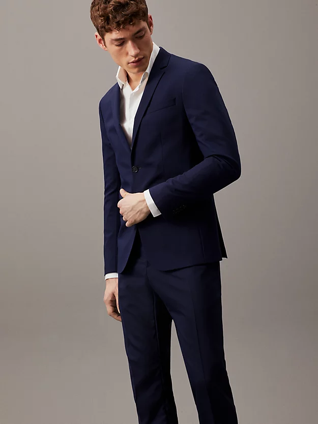 Blazer de abotoamento simples em lã elástica com modelagem slim.