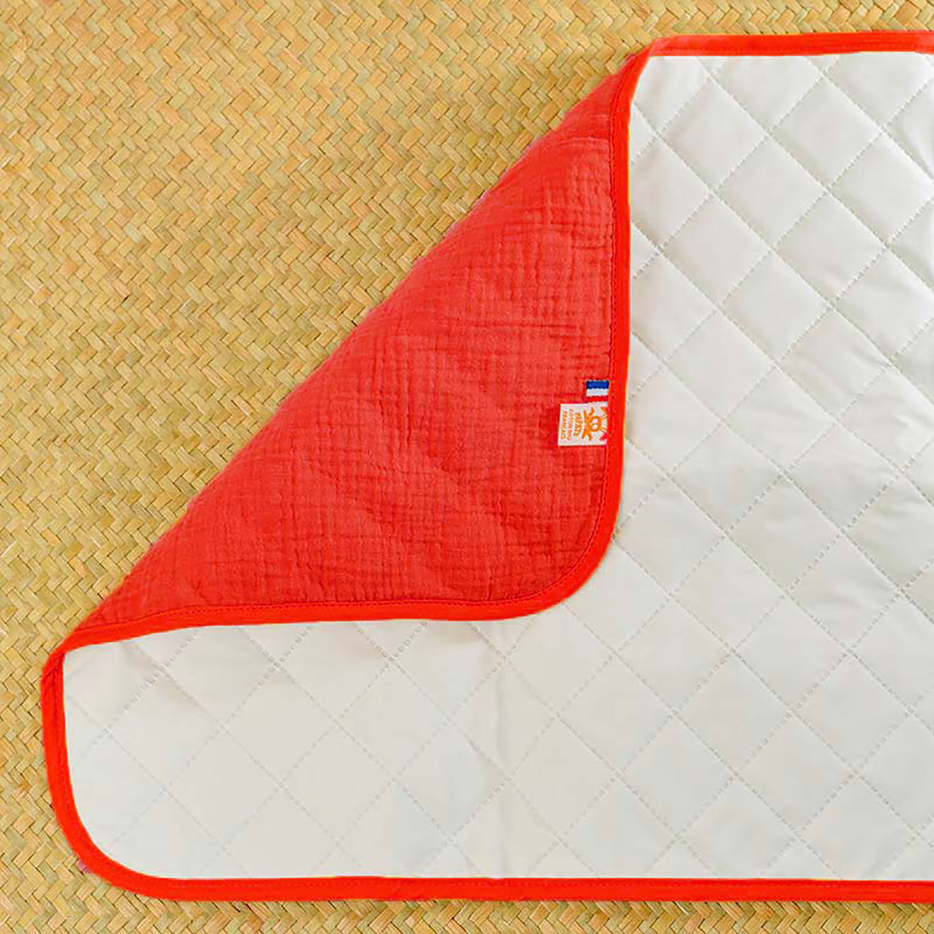 Papate Tapis à Langer Nomade en Coton Bio fraise - 65x42 cm