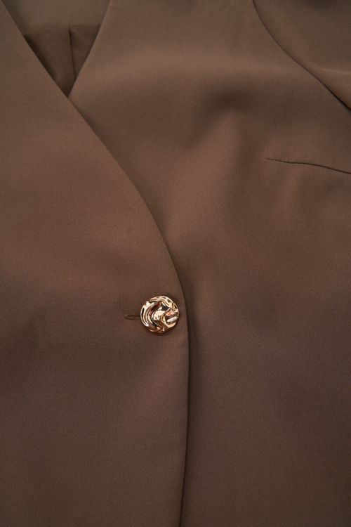 Bruine top met overlap en lange pofmouwen
