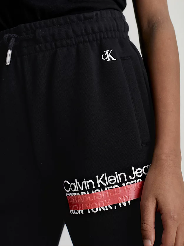 Calças de moletom com logo e modelagem relaxada
