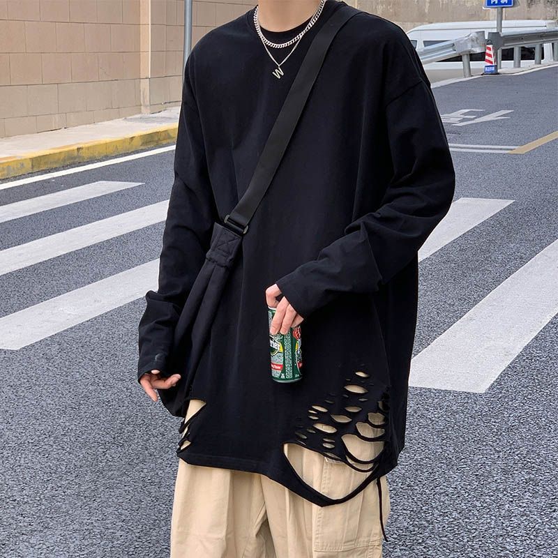 Whyessa - Versleten oversized top met lange mouwen