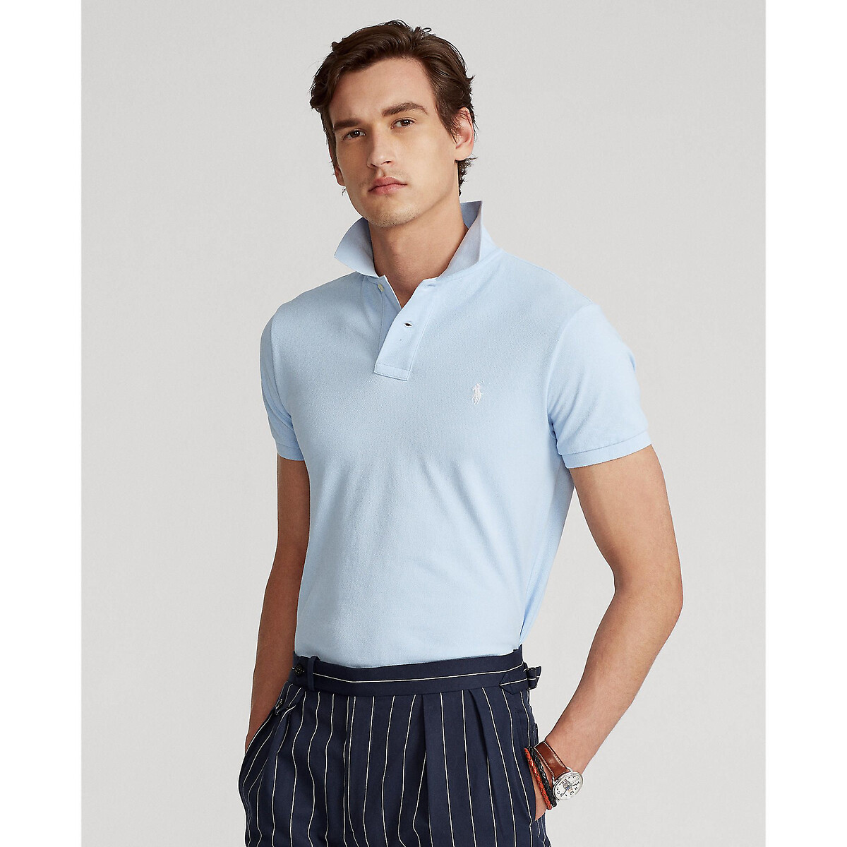 POLO RALPH LAUREN<br>Polo slim fit confeccionado em piqué de algodão